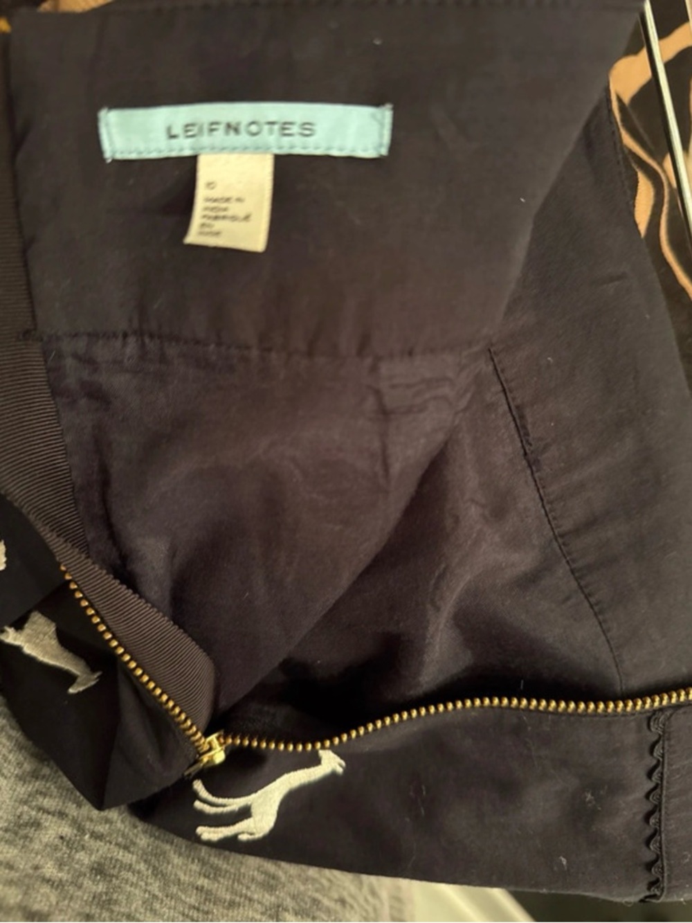 Size 10 Anthropologie midi skirt. Black with white Embroidered Giraffes. - Picture 2 of 3